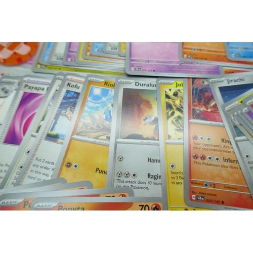 2251 - A large collection of Pokémon cards with holographic in collectors tin, no energy cards