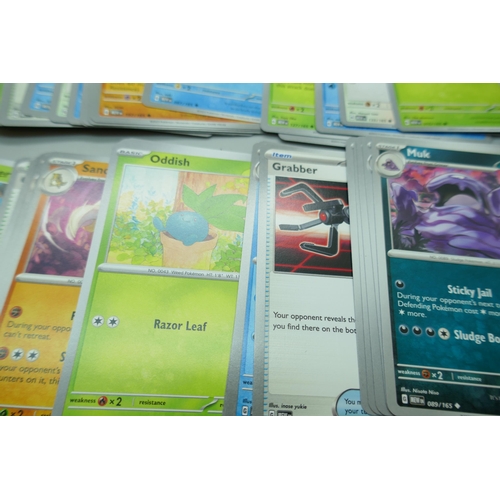 2255 - A large collection of ‘151’ scarlet and violet Pokémon cards including holographic