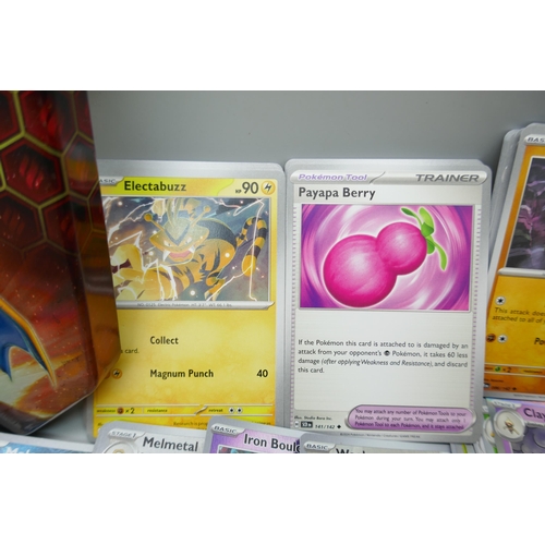 2259 - A large collection of Pokémon cards with holographic in collectors tin, no energy cards