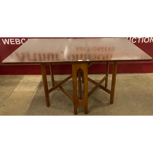 38 - A Jentique teak drop leaf dining table