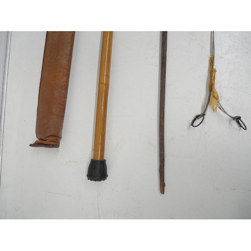 2271 - Two Wade sticks, one bamboo with leather strap and wooden with metal handle, trout snear and a fly f... 