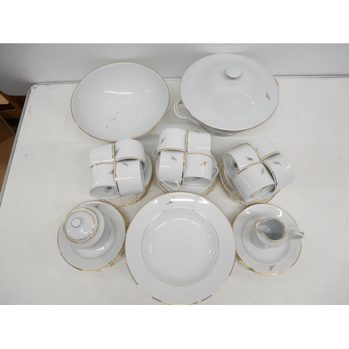 2293 - A Limoges France dinner service comprising of twelve coffee cups & saucers, six small plates, sugar ... 