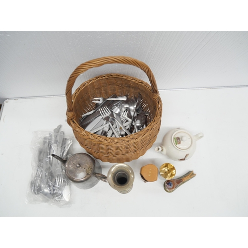 2296 - A box of assorted small china figures and a basket containing flatware and other plated ware **PLEAS... 