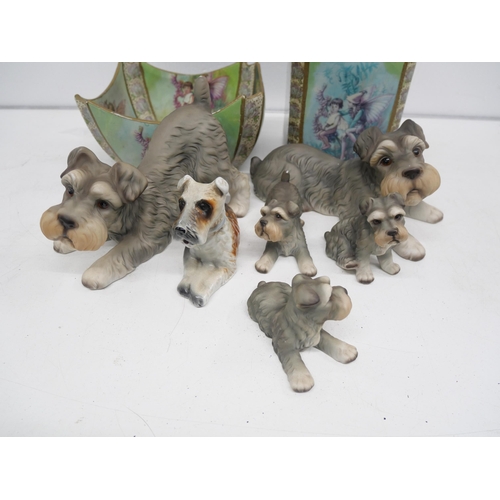 2302 - A collection of six porcelain dogs together with a Carltons Fantasia fairy/pixie themed fruit bowl a... 