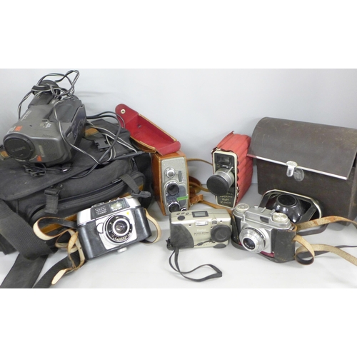 2335 - A collection of cameras includes a Beirette, Prontor, Kodak Instamatic, an 8mm Cimatic video camera ... 