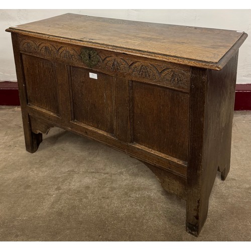 213 - A Charles II carved oak coffer
