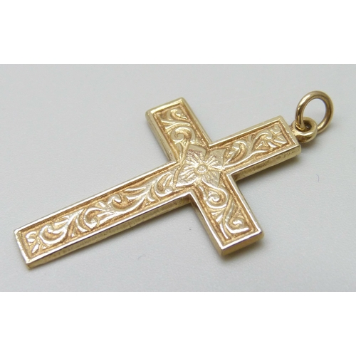 7014 - A 9ct gold engraved cross pendant, 3.4g, 3.7cm including bale