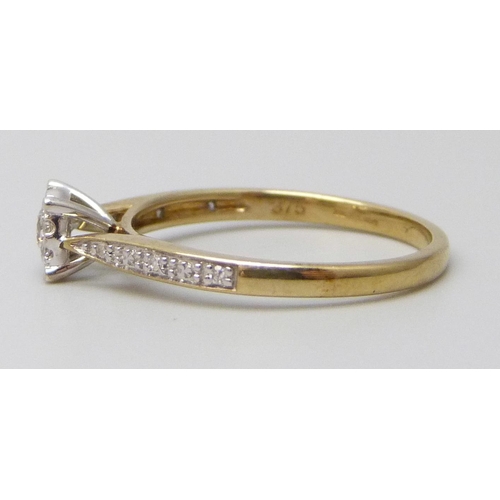 7020 - A 9ct gold and diamond ring, 0.15 carat weight, 1.5g, M