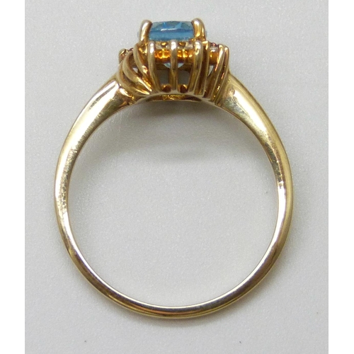 7030 - A 9ct gold Swiss blue topaz ring, with certificate, 2.4g, N