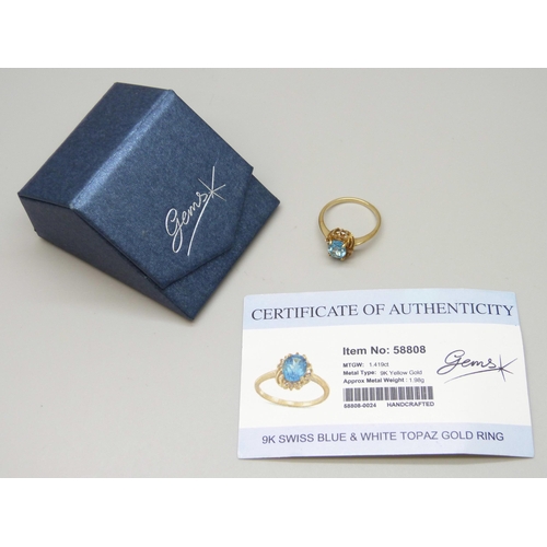 7030 - A 9ct gold Swiss blue topaz ring, with certificate, 2.4g, N