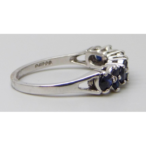 7033 - A 9ct white gold and sapphire ring, 2.5g, O