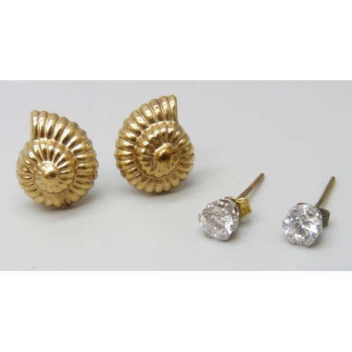 7037 - A pair of yellow metal shell stud earrings, 1.4g, together with three pairs of marked 9ct gold earri... 