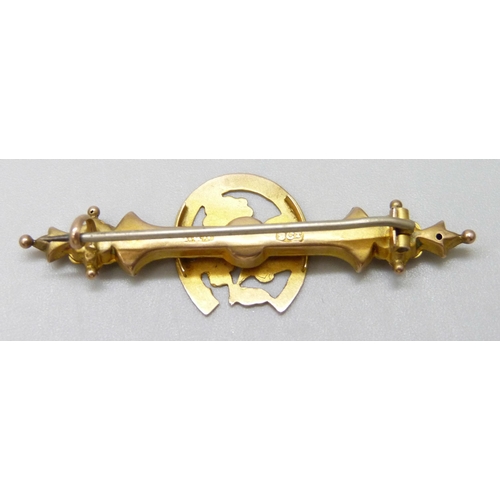 7042 - A Victorian 9ct gold bar brooch with horseshoe and floral design, metal pin, 1.7g, 4.5cm