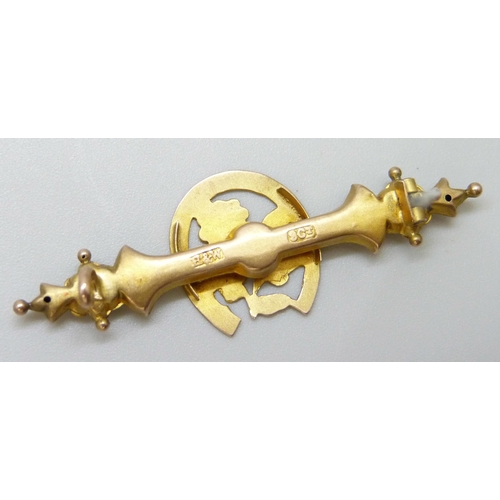 7042 - A Victorian 9ct gold bar brooch with horseshoe and floral design, metal pin, 1.7g, 4.5cm