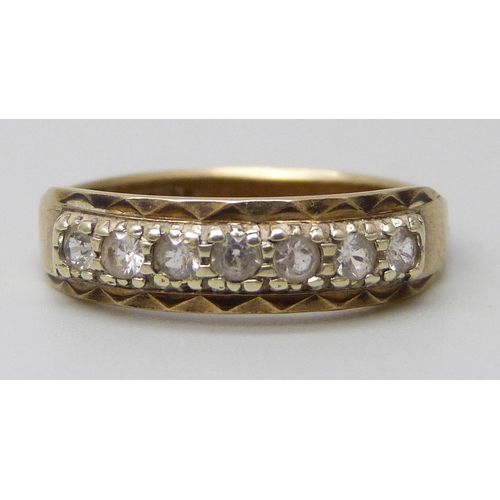 7052 - A 9ct gold ring set with seven white stones, 2.6g, Q, together with a white metal and green stone ri... 