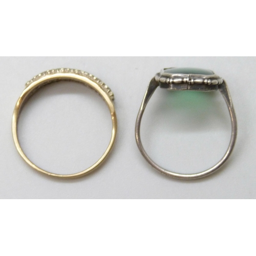 7052 - A 9ct gold ring set with seven white stones, 2.6g, Q, together with a white metal and green stone ri... 