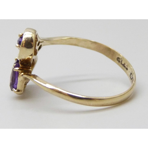 7059 - A 9ct gold amethyst and white stone ring, 1.4g, K/L