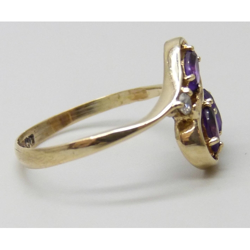 7059 - A 9ct gold amethyst and white stone ring, 1.4g, K/L