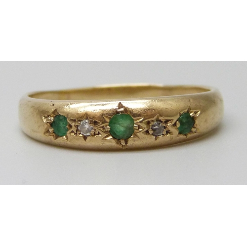 7062 - A 9ct gold, emerald and diamond ring, 3.2g, W