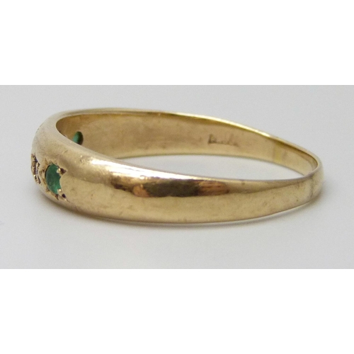 7062 - A 9ct gold, emerald and diamond ring, 3.2g, W