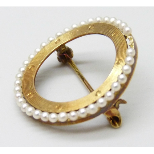 7068 - A 14ct gold circular brooch with seed pearl border, lacking two pearls and misshapen, 2.5g, 2.2cm