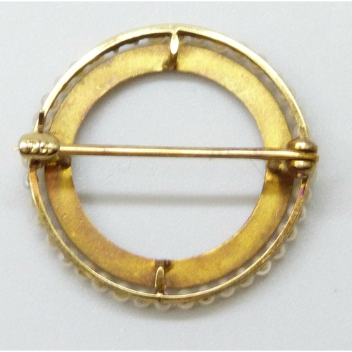 7068 - A 14ct gold circular brooch with seed pearl border, lacking two pearls and misshapen, 2.5g, 2.2cm