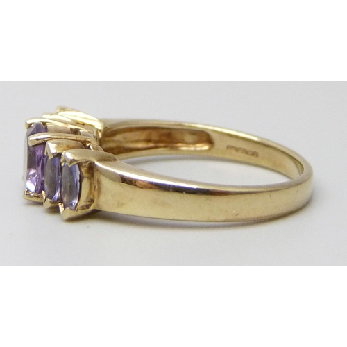 7077 - A 9ct gold, amethyst and purple stone set ring, 3.2g, N