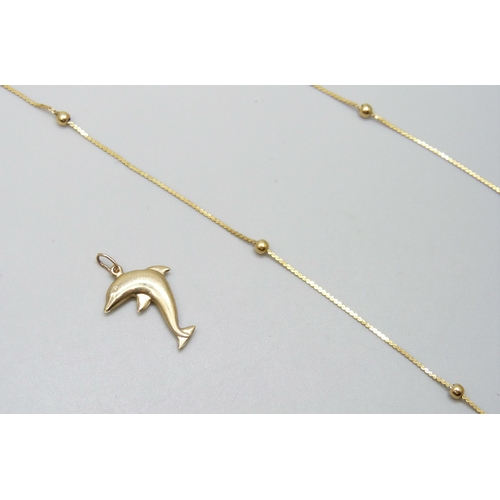 7079 - A 9ct gold chain, a/f, 1.5g together with a 9ct gold dolphin pendant, 0.4g