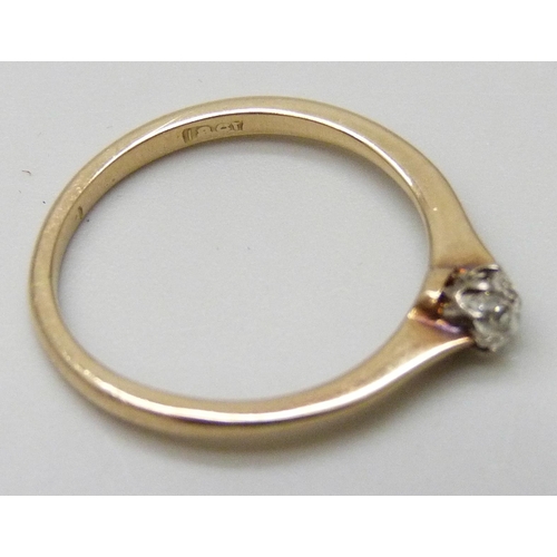 7083 - An 18ct gold diamond solitaire ring, approximately 0.1 carat, 1.7g, L