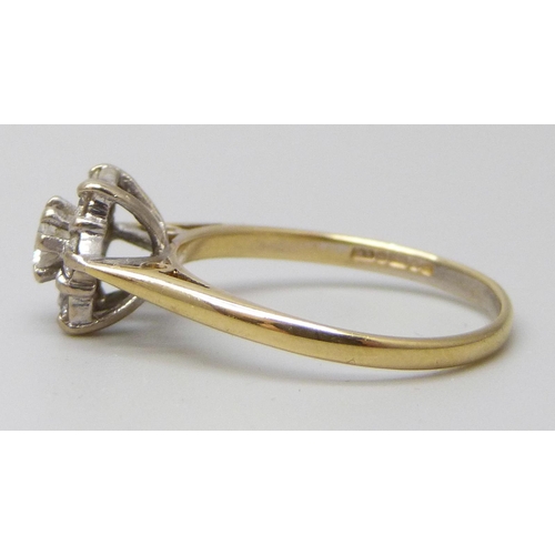 7085 - An 18ct gold diamond cluster ring, shank stamped .40ct, 2.9g, O