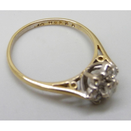 7085 - An 18ct gold diamond cluster ring, shank stamped .40ct, 2.9g, O