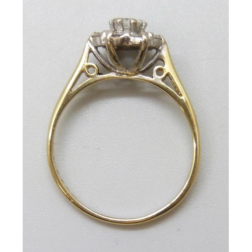 7085 - An 18ct gold diamond cluster ring, shank stamped .40ct, 2.9g, O