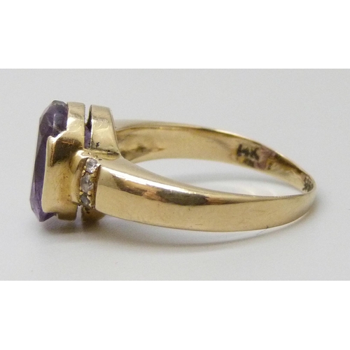 7099 - A yellow metal amethyst and diamond ring, stamped 14k, stone a/f, small split to shank, 4.6g, N