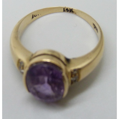 7099 - A yellow metal amethyst and diamond ring, stamped 14k, stone a/f, small split to shank, 4.6g, N