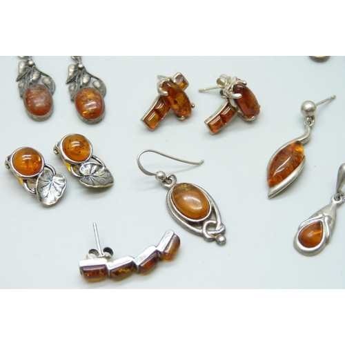 7101 - Four pairs of silver and amber earrings, two pairs of white metal and amber earrings, together with ... 