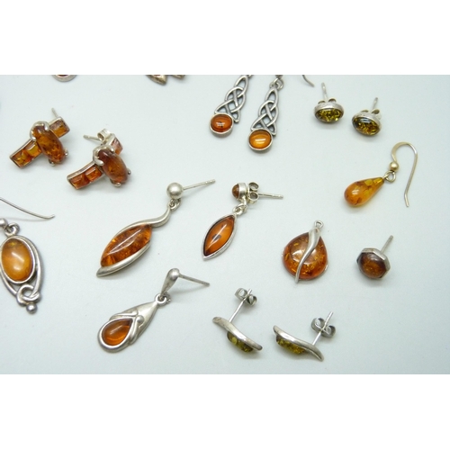 7101 - Four pairs of silver and amber earrings, two pairs of white metal and amber earrings, together with ... 