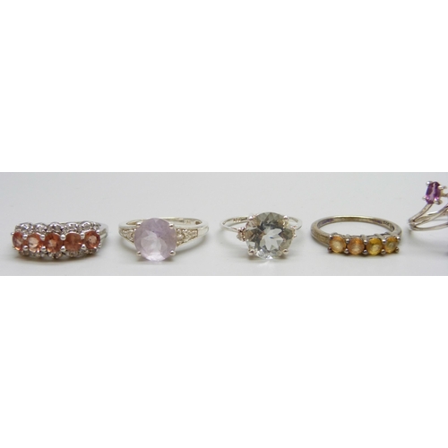 7108 - Eight silver gem set rings, 24g