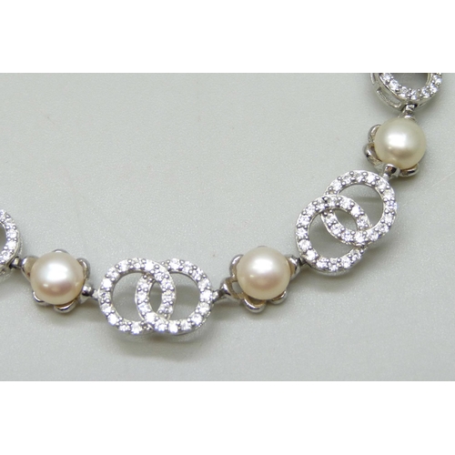 7118 - A silver, pearl and stone set bracelet, 12.8g, 20cm