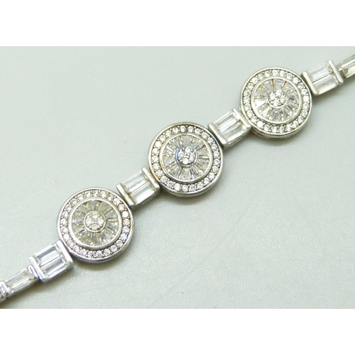 7120 - A silver and cubic zirconia multi stone set bracelet, 12.2g, 18cm