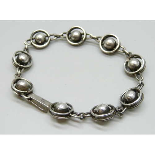 7122 - A .900 silver Modernist style bracelet, 22g, 22.5cm