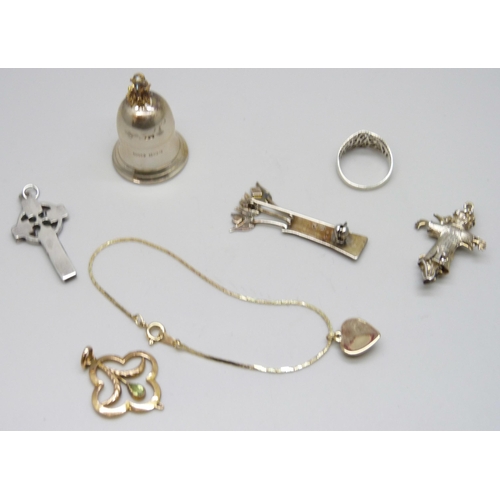 7152 - A collection of silver including a tooth fairy box, silver jewellery, a white metal scarecrow charm,... 