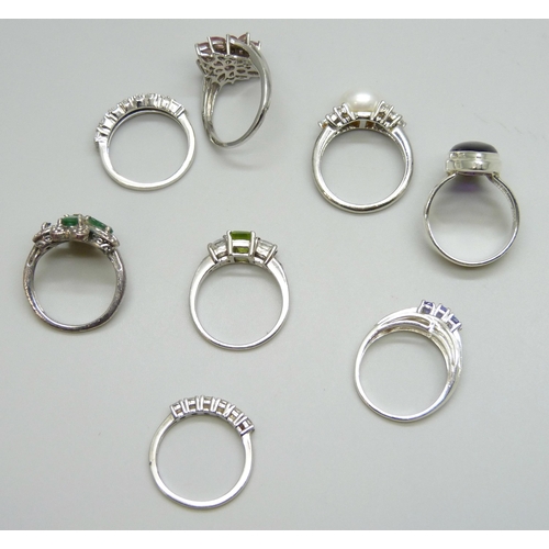 7155 - Eight silver gem set rings, 27g