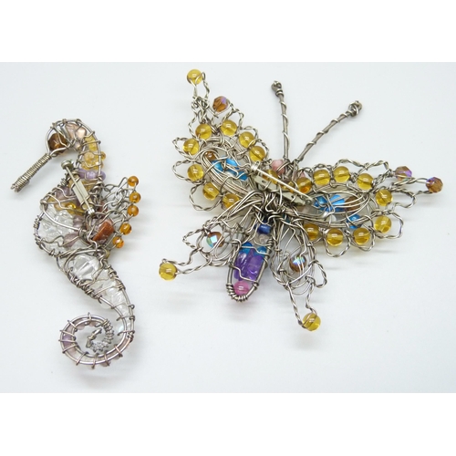 7171 - A handmade gem set butterfly brooch, and a seahorse brooch