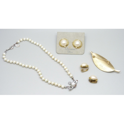 7173 - Two pairs of Christian Dior earrings, a Vivienne Westwood necklet, and a Trifari brooch