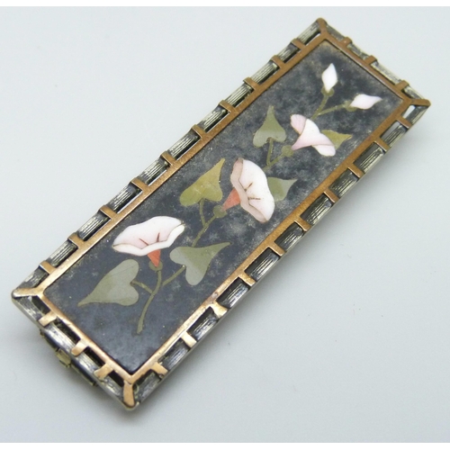 7177 - A pietra dura brooch in a metal mount, 6.3cm