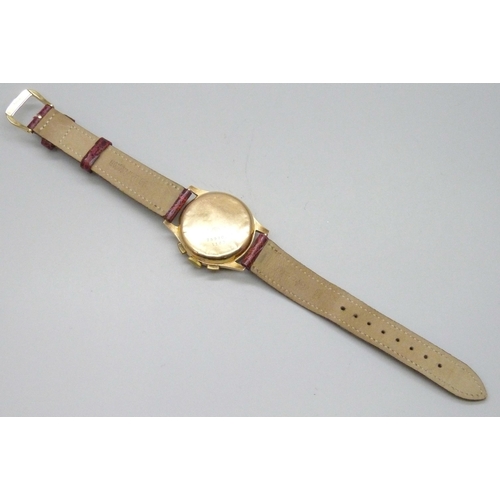 7236 - An 18ct gold cased Agari Suisse chronograph wristwatch, 34mm case, case back dented