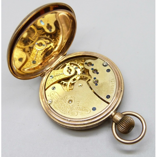 7238 - A 9ct gold cased fob watch, lacking bezel and glass, 28g total weight