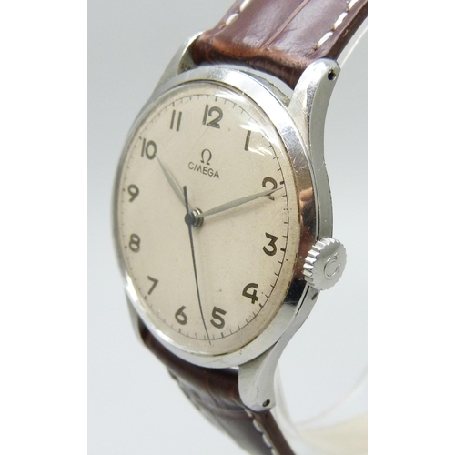 7239 - An Omega 2256 1944 oversized steel case, 30T2 calibre centre seconds, with 1940's Omega buckle, serv... 