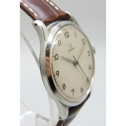 7239 - An Omega 2256 1944 oversized steel case, 30T2 calibre centre seconds, with 1940's Omega buckle, serv... 