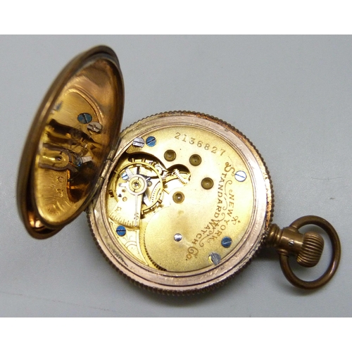 7252 - Two pocket watches, a fob watch, the dial marked N.Y. Standard Watch Co., and a wristwatch head